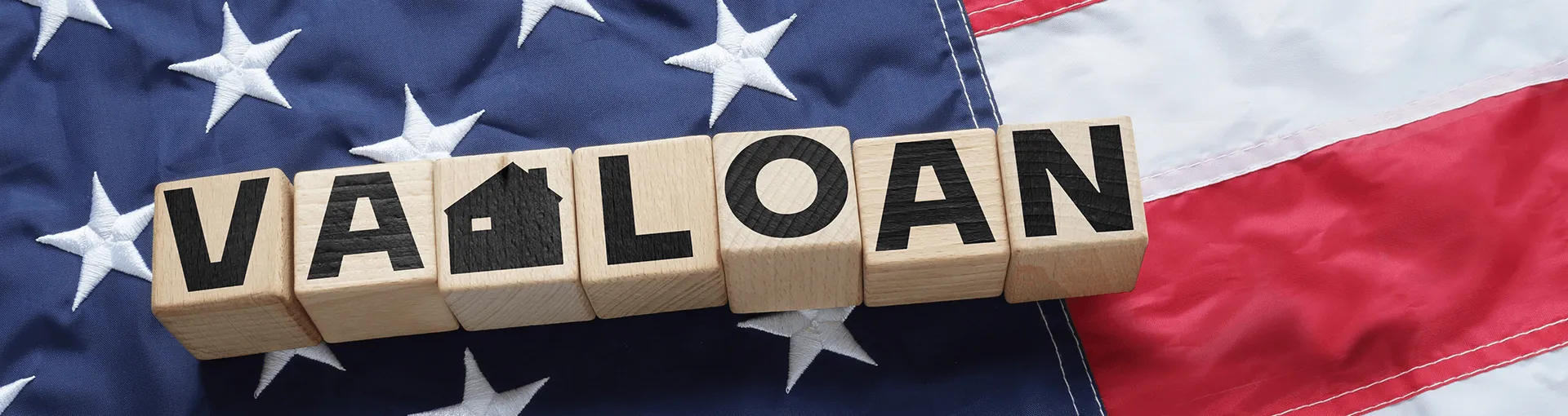 An American flag with VA Loan spelled in blocks