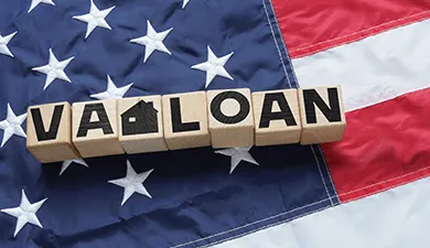 An American flag with VA Loan spelled in blocks